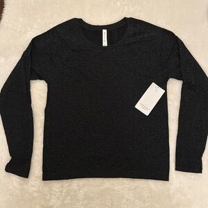 Athleta Momentum Seamless Top - Black and silver. Never worn / New with tags.